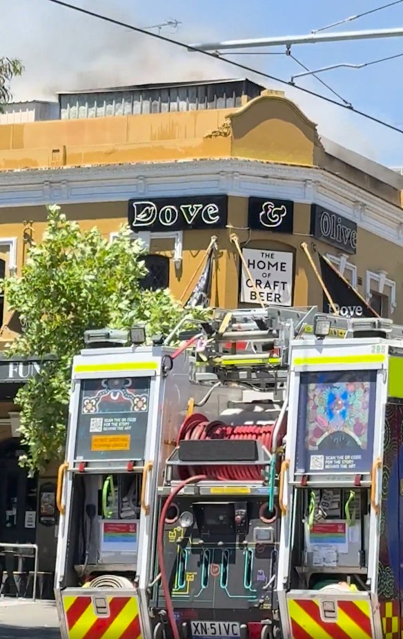 The fire at the heritage listed Dove and Olive has forced the suspension of light rail services.