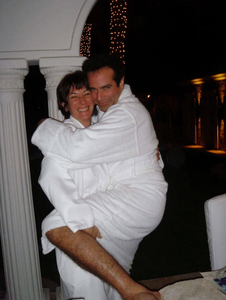 Ghislaine Maxwell poses with David Copperfield in this image released by the Department of Justice in Washington, D.C., U.S., on December 19, 2025 as part of a new trove of documents from its investigations into the late financier and convicted sex offender Jeffrey Epstein. Images were released without locations, dates or context.