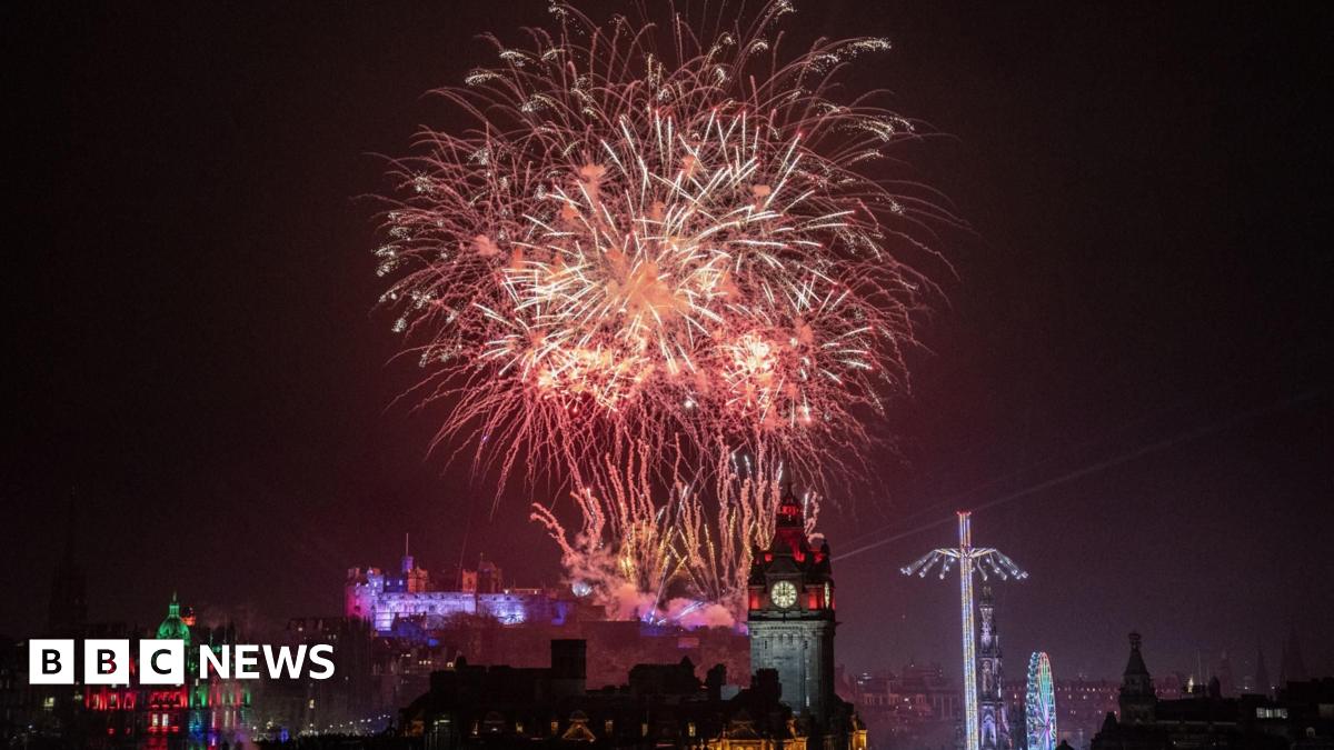 Fireworks exploding over Edinburgh Castle during the street party for Hogmanay New Year celebrations in Edinburgh.
