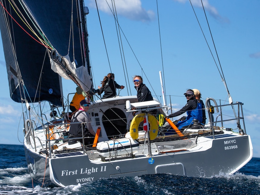 Yacht at sea with a crew of women.