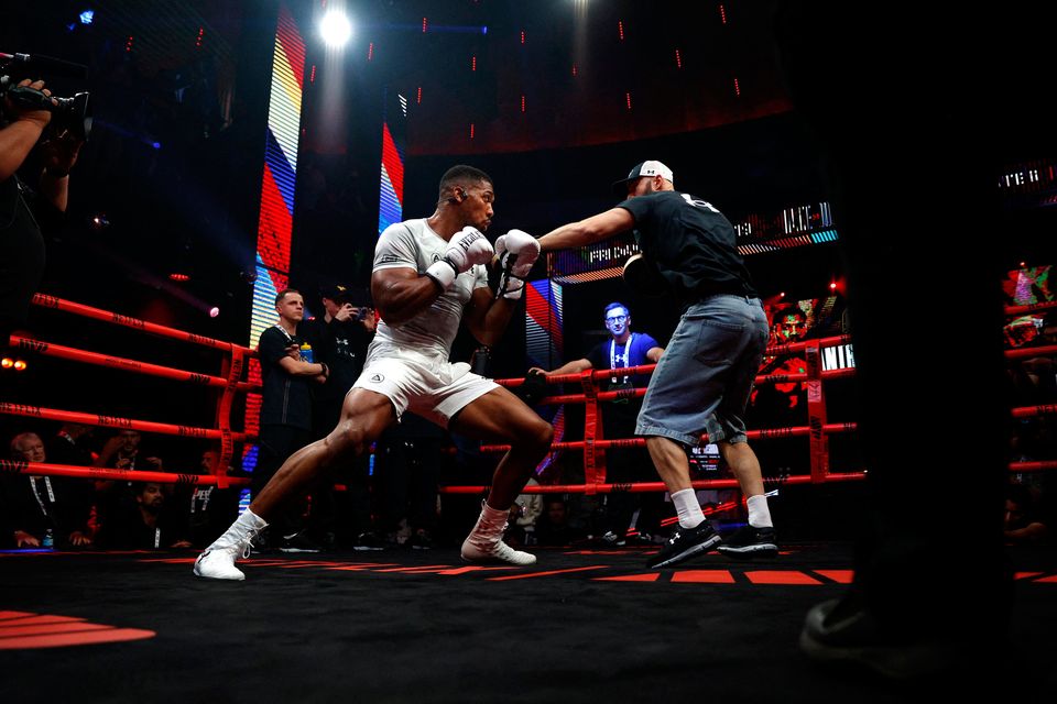 Anthony Joshua warms up to take on Jake Paul this Friday.