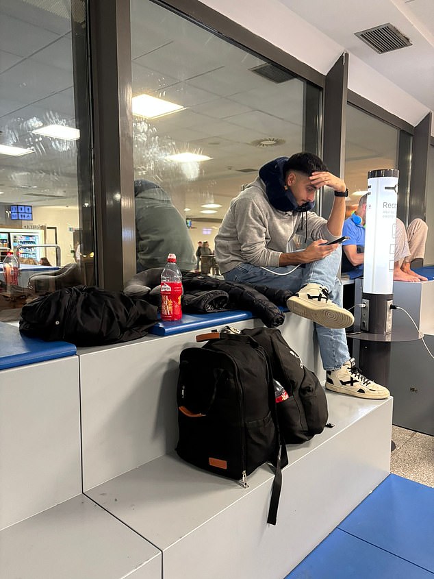 Ms Rowland's partner and other passengers waited in the terminal for their flights to be rescheduled