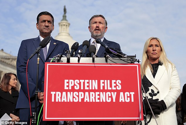 The two congressmen led efforts last month to pass the Epstein Files Transparency Act, which compelled the Trump administration to release all unclassified files it had on the late financier by December 19. They are pictured with Congresswoman Marjorie Taylor Greene
