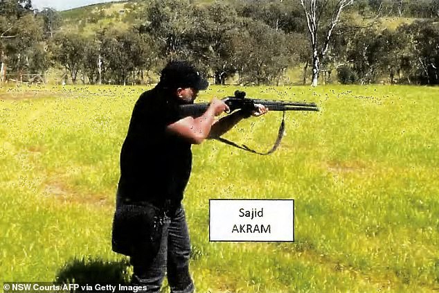 A screenshot from a video found on Naveed Akram's phone shows his father conducting firearms training, police allege