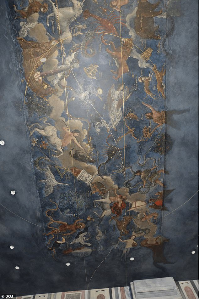 The ceiling is hand-painted, showing various animals and even constellations behind a cloudy sky, as well as zodiac symbols