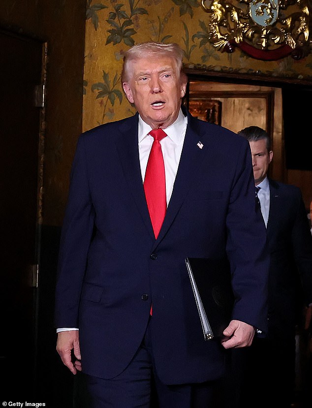 The Trump administration is now being accused of 'protecting' the co-conspirators, whose names were redacted from the file