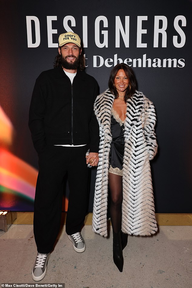 He is currently dating make-up artist Lou Teasdale, 41. The couple are pictured at the Debenhams x ASHISH Launch Event on October 8