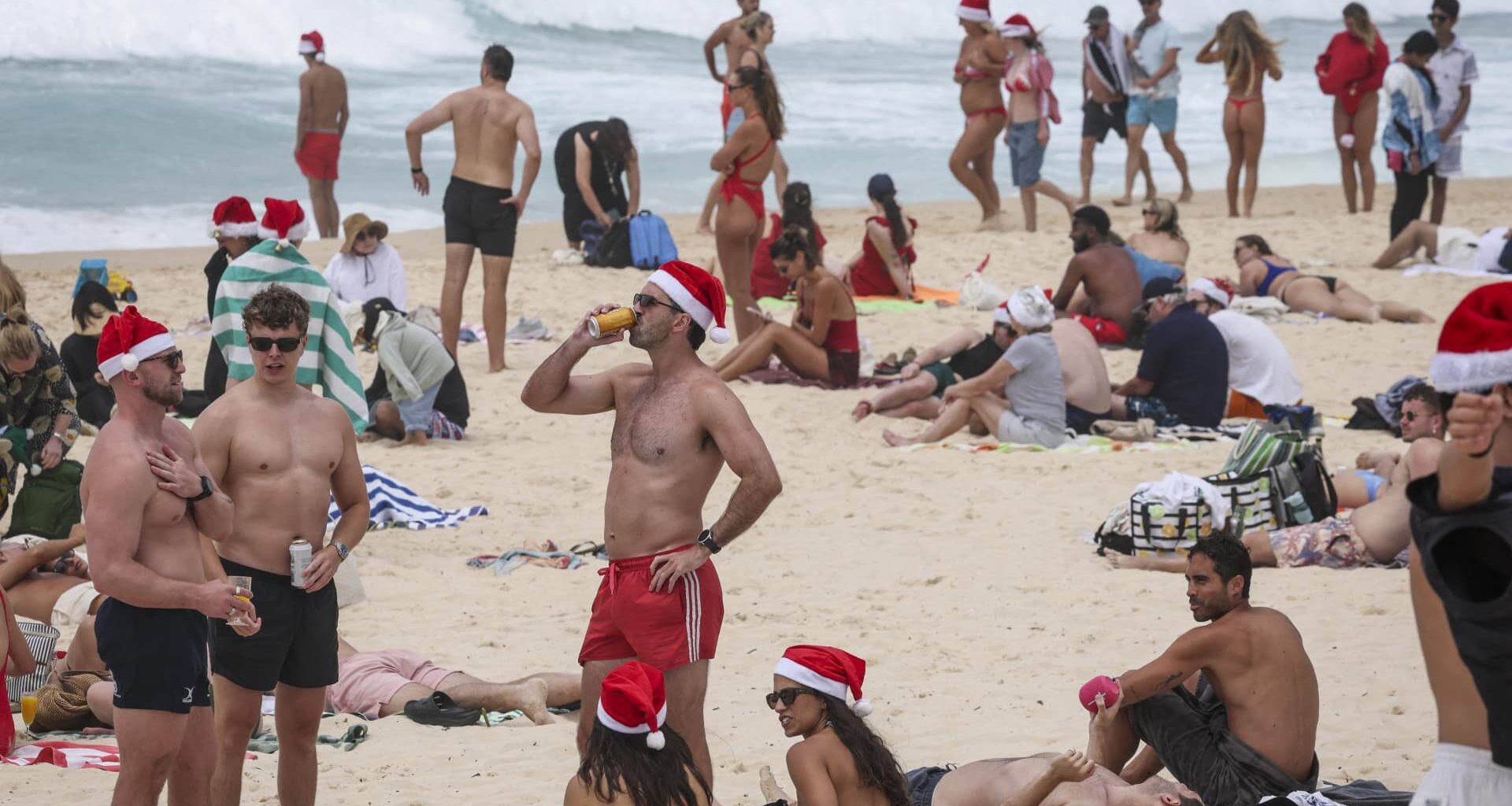 Christmas celebrations muted at Bondi as Australians grieve after deadly shooting