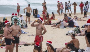 Christmas celebrations muted at Bondi as Australians grieve after deadly shooting