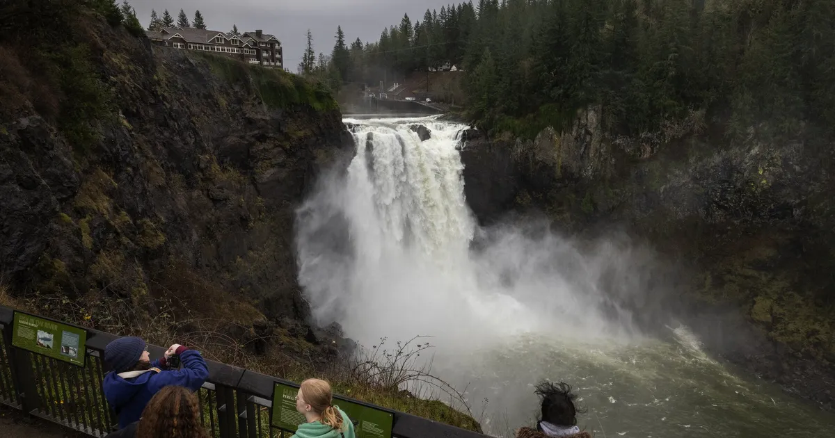 Storm hits WA hard; cities brace for ‘double crest’ of record floods
