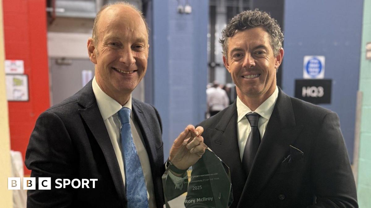 Stephen Watson presents the BBC NI Sports Personality of the Year award to Rory McIlroy