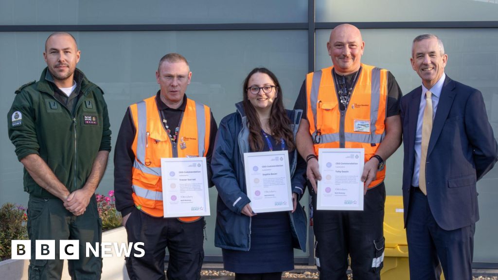 Stansted Airport staff awarded for saving man's life