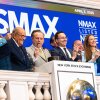 Newsmax will pay $67 million to Dominion Voting Systems to settle a lawsuit over the network's coverage of the 2020 presidential election. In this photo from April 3, 2025, Newsmax CEO Chris Ruddy and former New York City Mayor Rudy Giuliani join others at the opening of trading at the New York Stock Exchange.