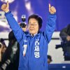 Lee Jae-myung, the presidential candidate for South Korea's Democratic Party, gestures onstage during his final election campaign event ahead of the upcoming June 3 presidential election in Seoul on June 2, 2025. (Photo by ANTHONY WALLACE / AFP) (Photo by ANTHONY WALLACE/AFP via Getty Images)