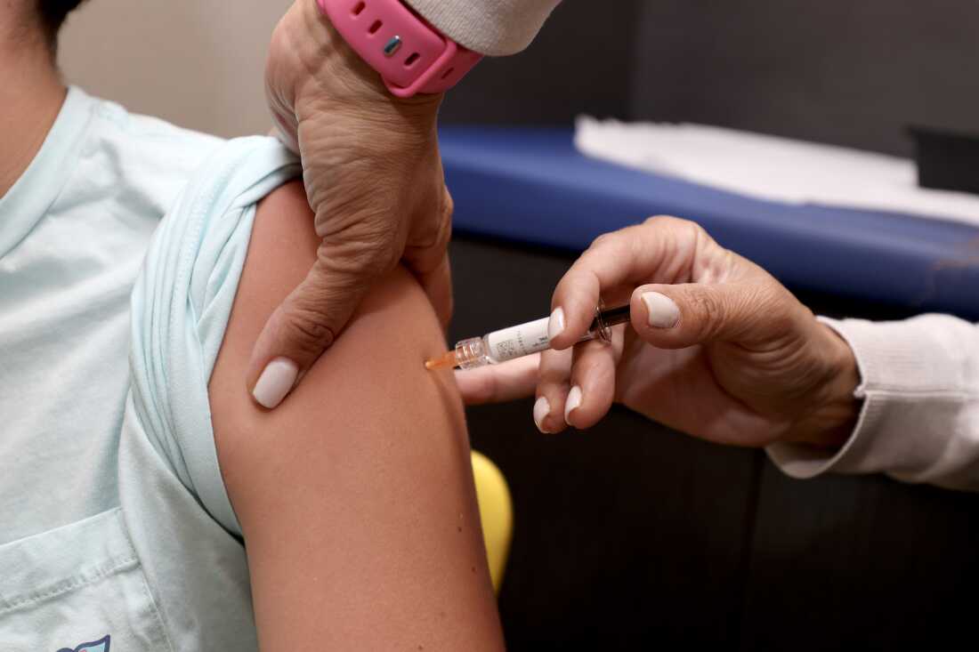 A child gets immunized at a Florida pediatrician's office in September. Florida Pediatric office on September 15, 2025, in Coral Gables, Florida.  (Photo by Joe Raedle/Getty Images)