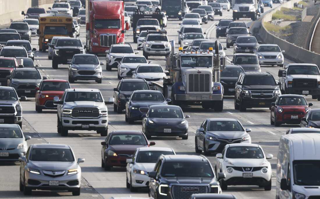 Motorists drive on Interstate 210 during the morning commute on December 03, 2025 in Pasadena, Calif. President Trump announced new fuel economy standards today which will roll back fuel efficiency standards put in place by former President Joe Biden.