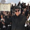 Director Jafar Panahi, winner of the Palme d'Or for the film 'It Was Just an Accident', poses for photographers at the awards ceremony photo call at the 78th international film festival, Cannes, southern France, Saturday, May 24, 2025. (AP Photo/Natacha Pisarenko)