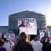 Demonstrators holding signs in support of minority voting rights gather outside the U.S. Supreme Court in Washington, D.C., on Wednesday. Some signs say "Protect our Vote."