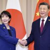 Chinese President Xi Jinping (right) shakes hands with Japanese Prime Minister Sanae Takaichi ahead of their meeting in Gyeongju, South Korea, Oct. 31.