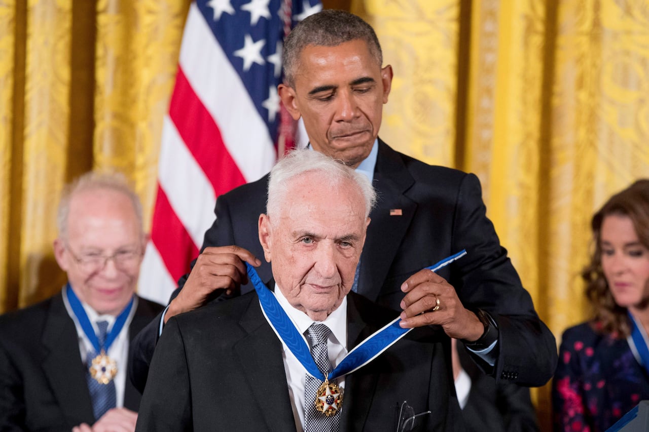 President Barack Obama presents the Presidential Medal of Freedom to architect Frank Gehry during a ceremony in the East Room of the White House, Tuesday, Nov. 22, 2016, in Washington.  (AP Photo/Andrew Harnik)