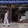 A Kashmiri man walks past a shop displaying stone jewelry and Kashmiri handicrafts in Srinagar, in Indian-controlled Kashmir.