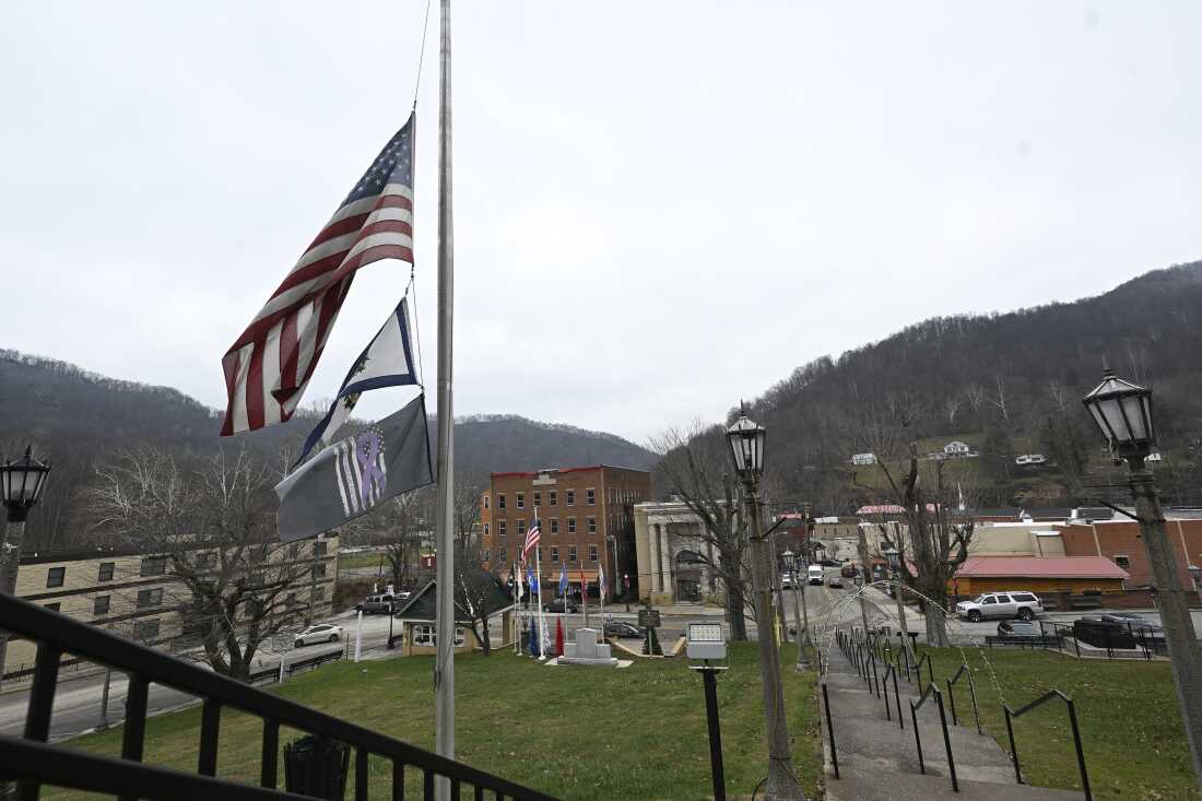 Flags fly at half-staff for West Virginia National Guard Specialist Sarah Beckstrom at the Webster County Courthouse in Webster Springs, W.Va. on Dec. 3, 2025.