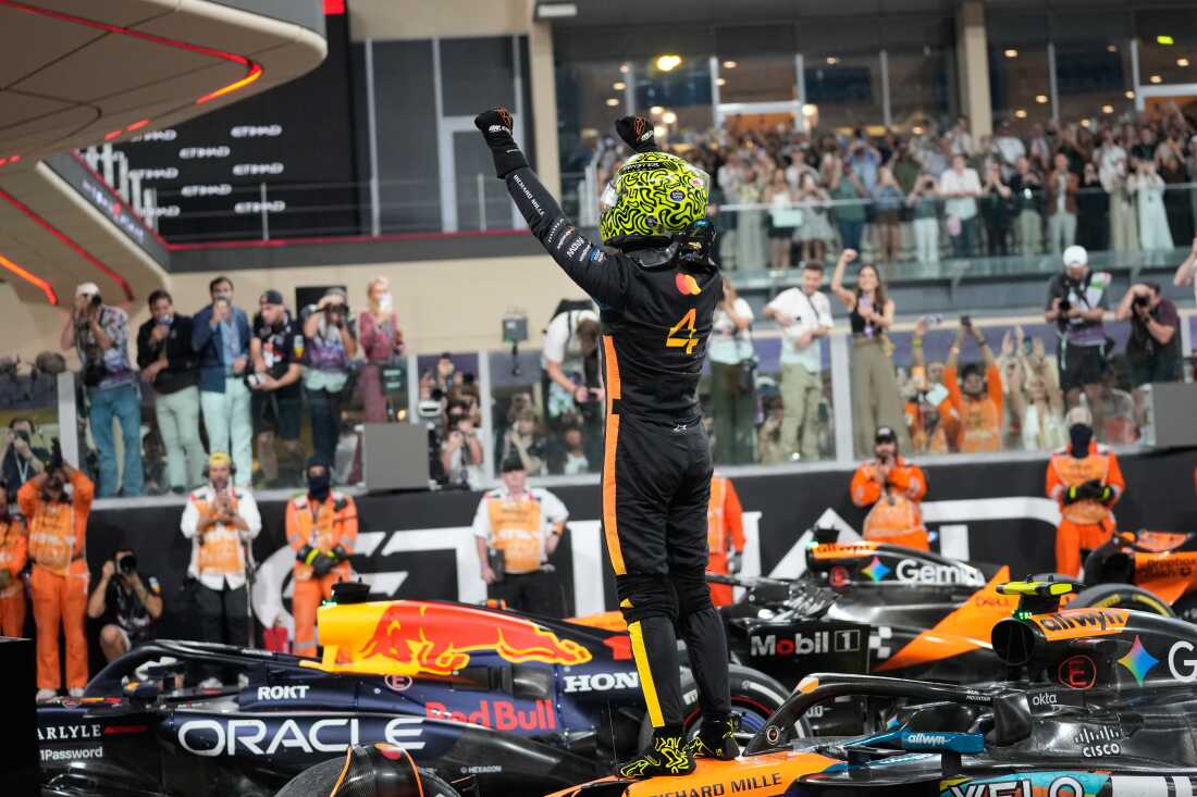 McLaren driver Lando Norris of Britain reacts after becoming a world champion after the Abu Dhabi Formula One Grand Prix in Abu Dhabi, United Arab Emirates, Sunday, Dec. 7, 2025. (