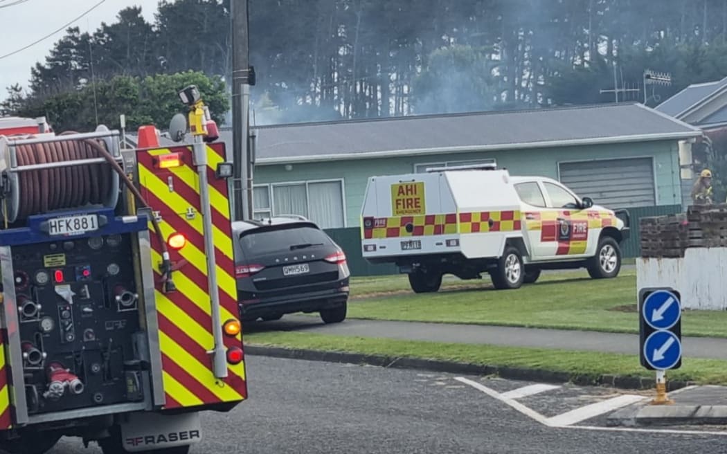 Fire crews have been battling a house fire in Foxton Beach .