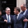 From left: Ukrainian President Volodymyr Zelenskyy, British Prime Minister Keir Starmer, French President Emmanuel Macron and German Chancellor Friedrich Merz chat on the 10 Downing Street doorstep after a meeting in central London on Monday. 8, 2025. (Photo by Adrian DENNIS / POOL / AFP via Getty Images)