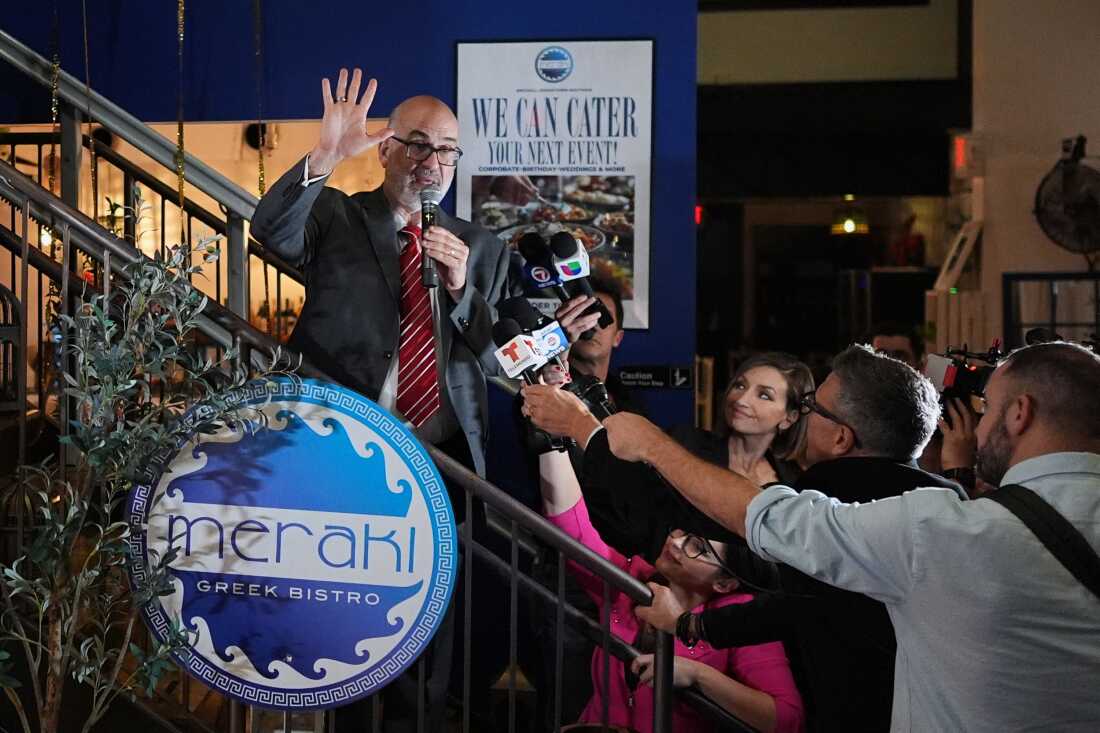 Miami mayor candidate Emilio Gonzalez, a former city manager backed by President Donald Trump, waves as he thanks supporters after conceding to Democrat Eileen Higgins in Miami's mayoral runoff election, at a watch party, in downtown Miami, Tuesday, Dec. 9, 2025.