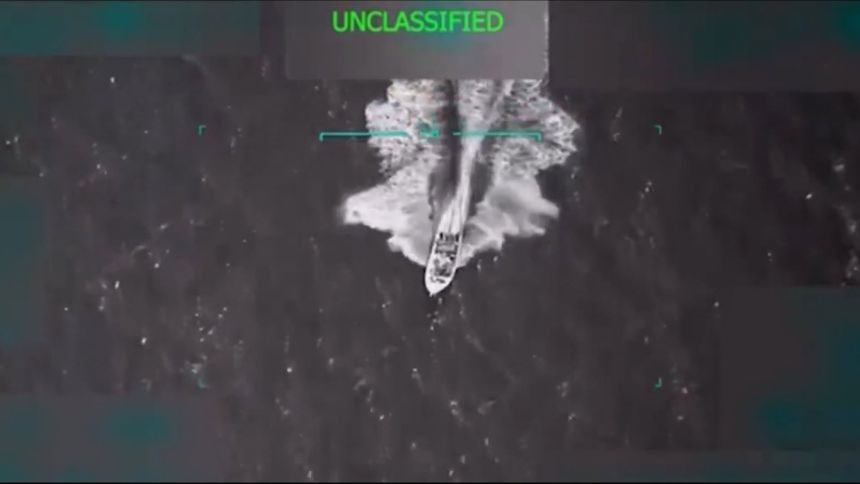 This screengrab taken from a video posted by the Defense Department shows a boat shortly before it is hit by a strike on September 2, 2025.