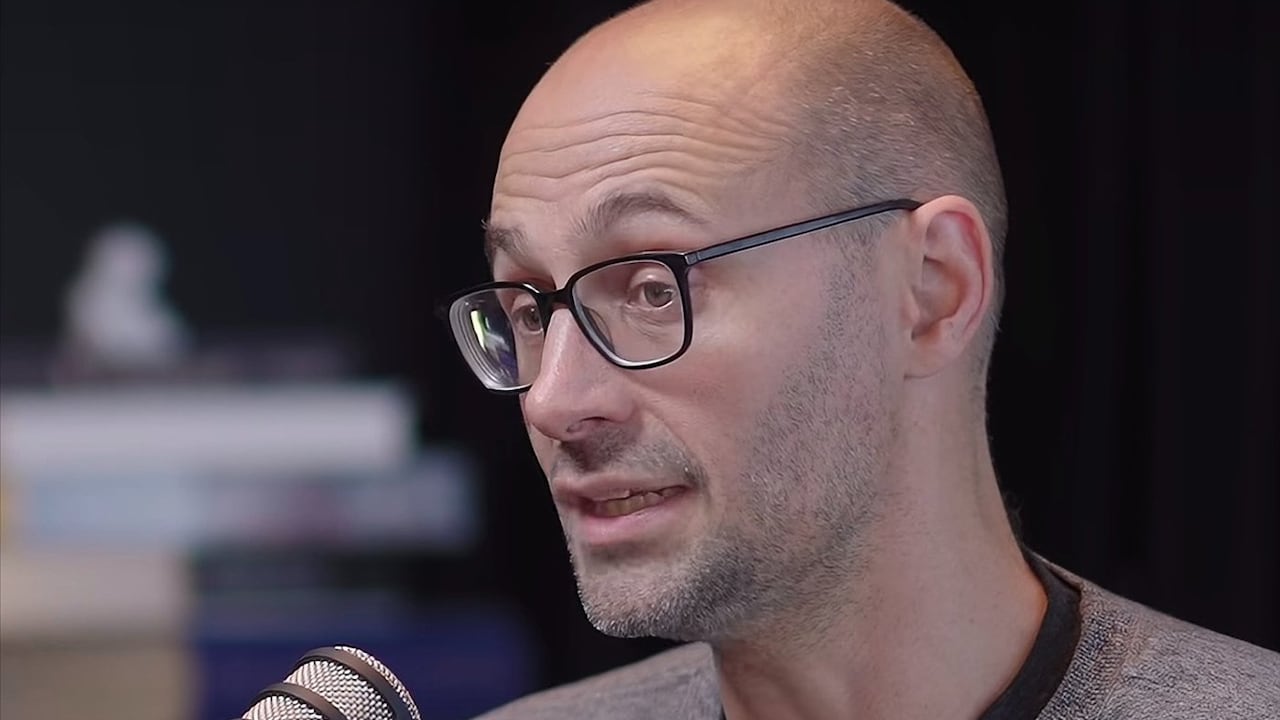 A man speaking into a microphone.