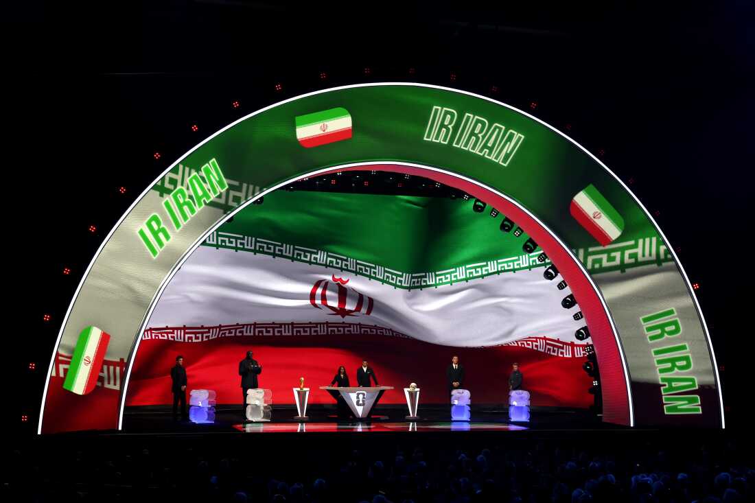 Iran is illuminated on the screen during the FIFA World Cup 2026 Official Draw on December 05, 2025 in Washington, D.C. Iran and Egypt have objected to playing in their match in Seattle because it previously had been scheduled to celebrate 'Pride'.
