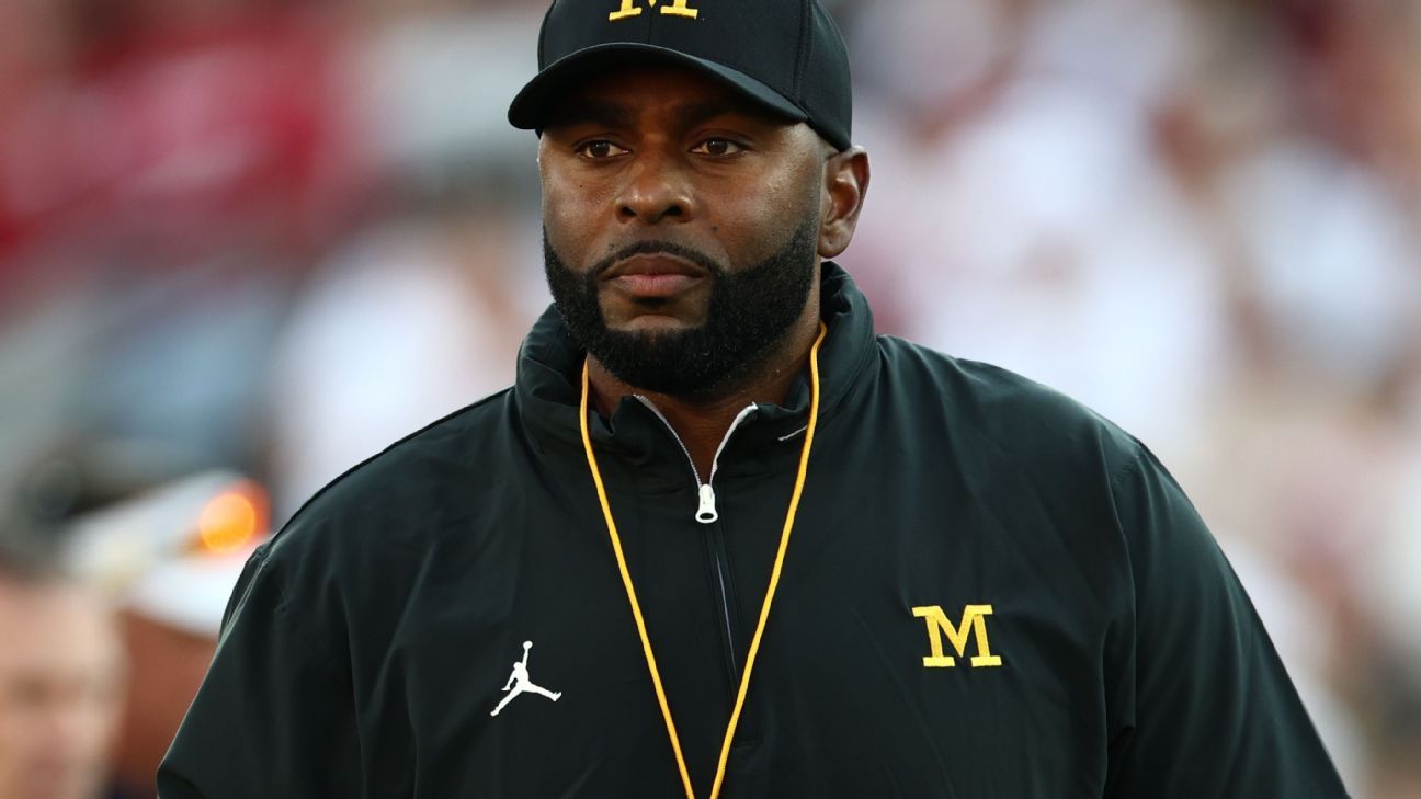 Fired Michigan coach Sherrone Moore in custody; no decision on charges