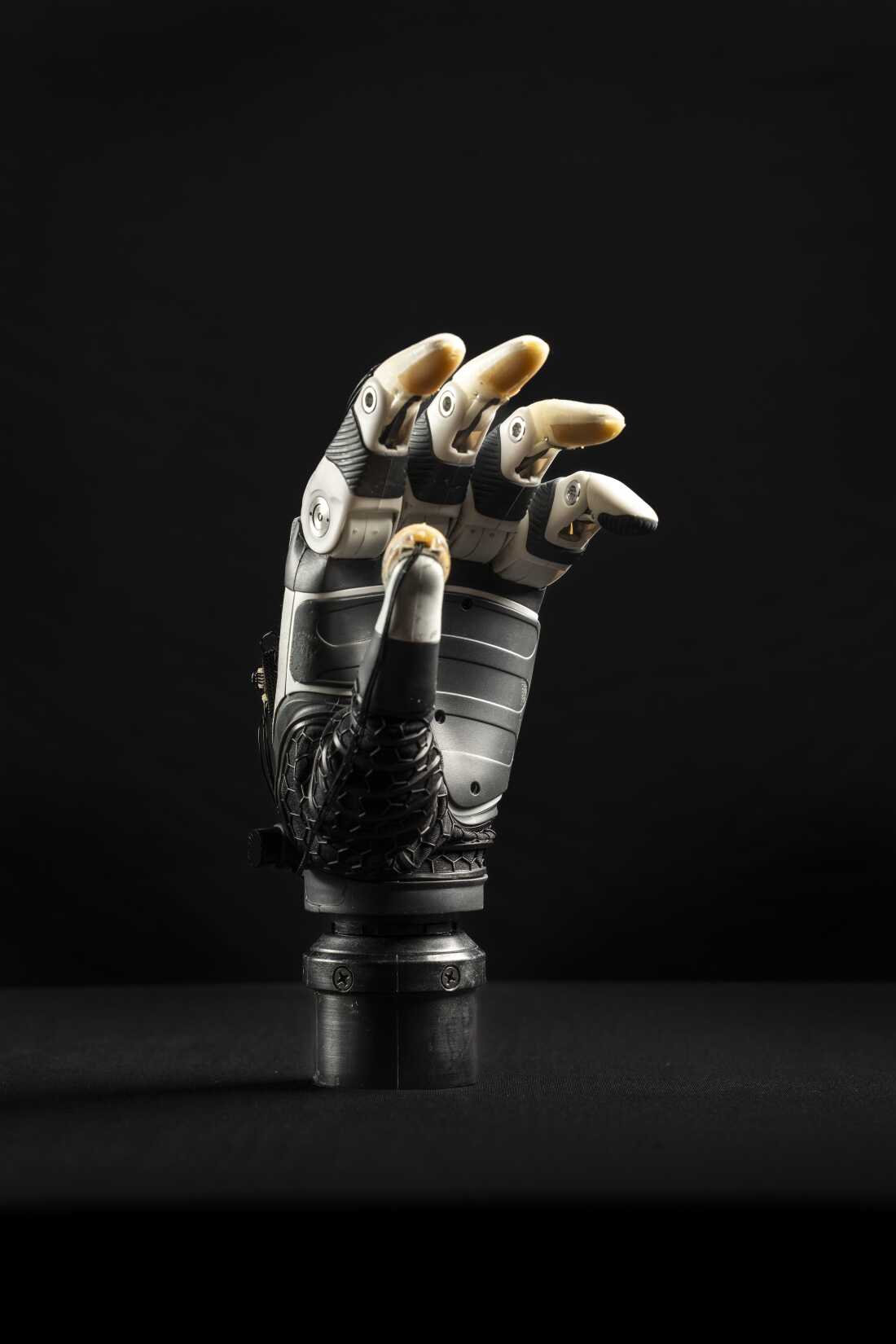 Using AI and a suite of sensors, researchers outfitted a bionic hand so that it share control with the brain when acting on instructions.