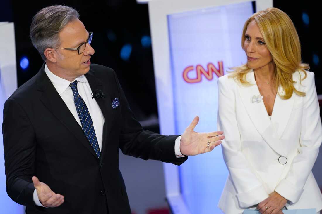 CNN anchors Jake Tapper and Dana Bash speaking to members of the audience before the start of the CNN Republican presidential debate in Des Moines, Iowa, Jan. 10, 2024.