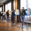 Voters fill out their ballots at a polling place on Election Day, Nov. 4, in Minneapolis, Minn.