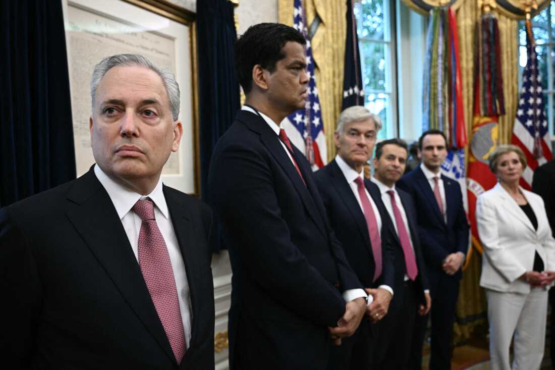 White House AI and crypto czar David O. Sacks looks on before US President Donald Trump signs executive orders.