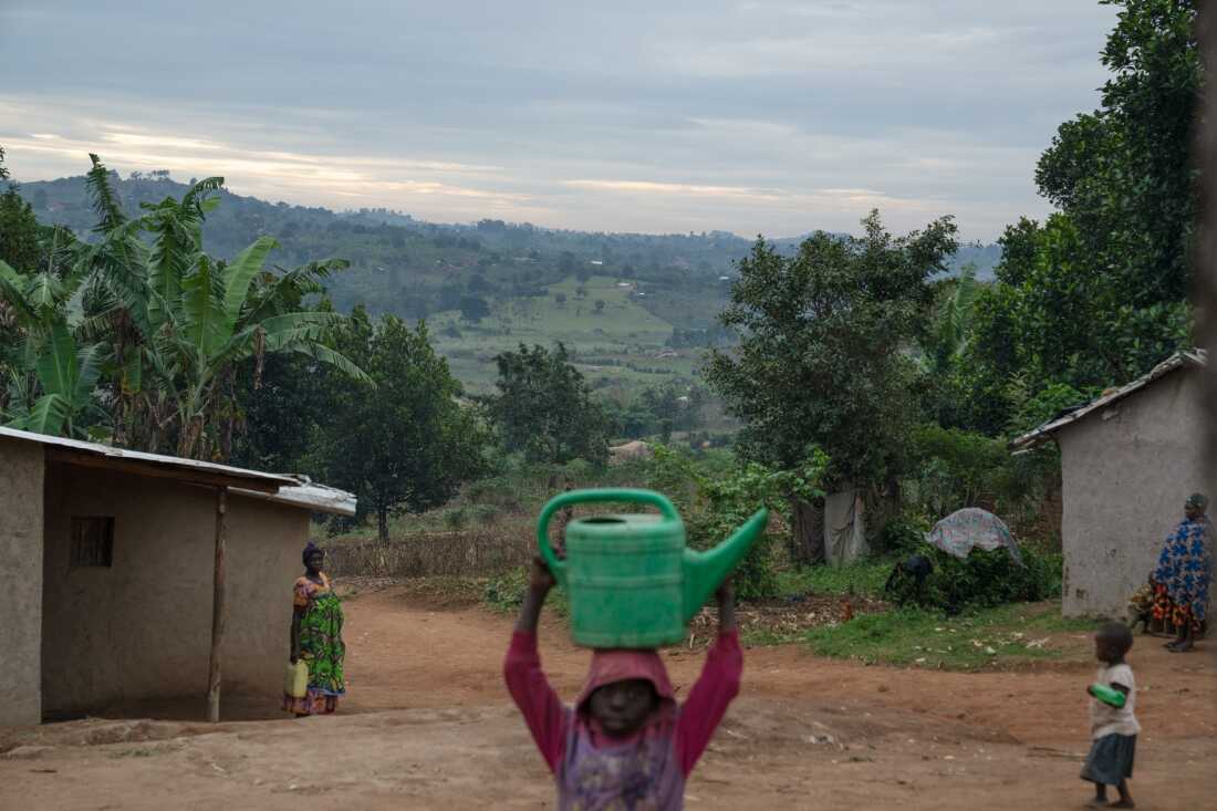 Most of the homes in the refugee camp near Kyegegwa, Uganda, are one-room huts with sheet metal roofs. 
