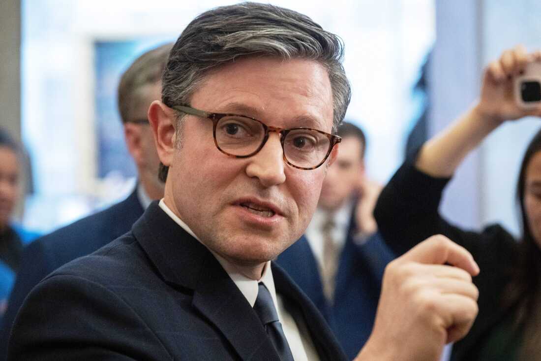 Speaker Mike Johnson, R-La., talks to reporters outside his office in the Capitol, Thursday, Dec. 4, 2025, in Washington.