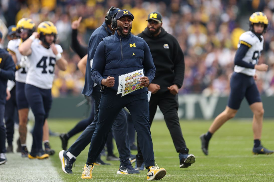 Head coach Sherrone Moore of the Michigan Wolverines celebrates a touchdown during a game against the Northwestern Wildcats on November 15, in Chicago, Illinois.
