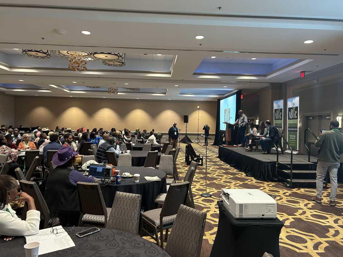 James Davis asks a question at a panel on farm finances at the National Black Growers Council conference in New Orleans on Dec. 10, 2025. Davis is a third-generation Black row crop farmer who said that despite having the best year he's ever had in his farming career, he's still struggling to pay his bills.