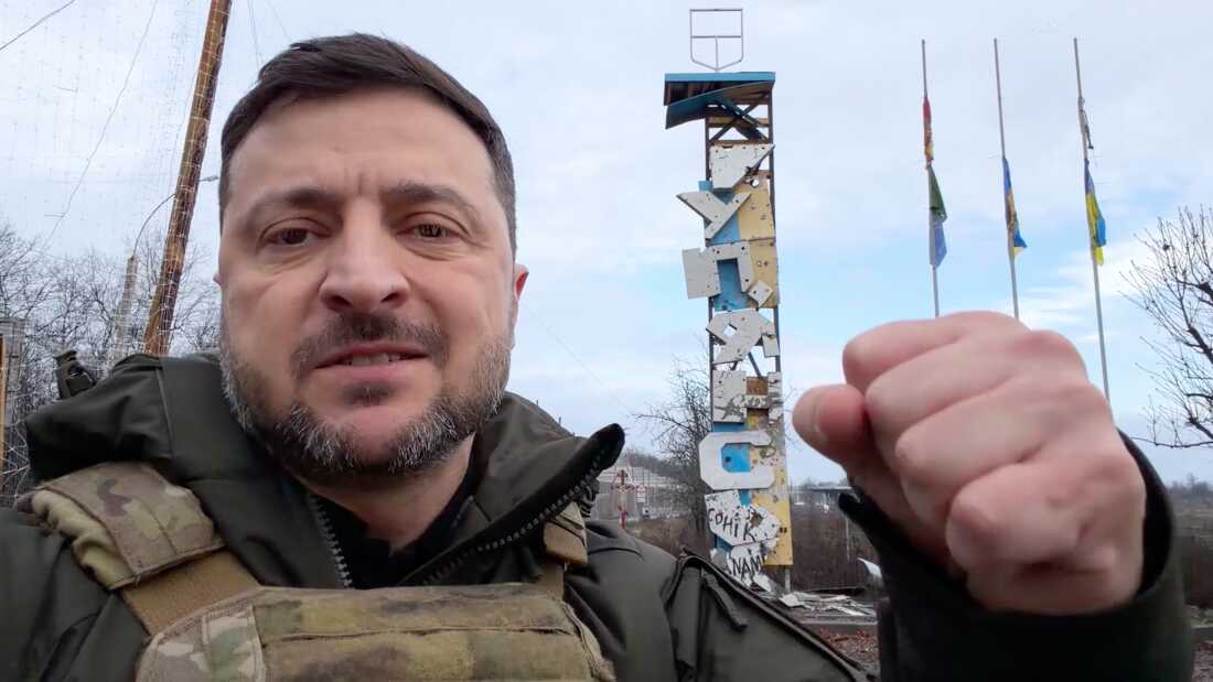 In this grab from a video provided by the Press Service Of The President Of Ukraine on Friday, Dec 12, 2025, Ukraine's President Volodymyr Zelenskyy records a video at the road entering of Kupiansk, Ukraine.