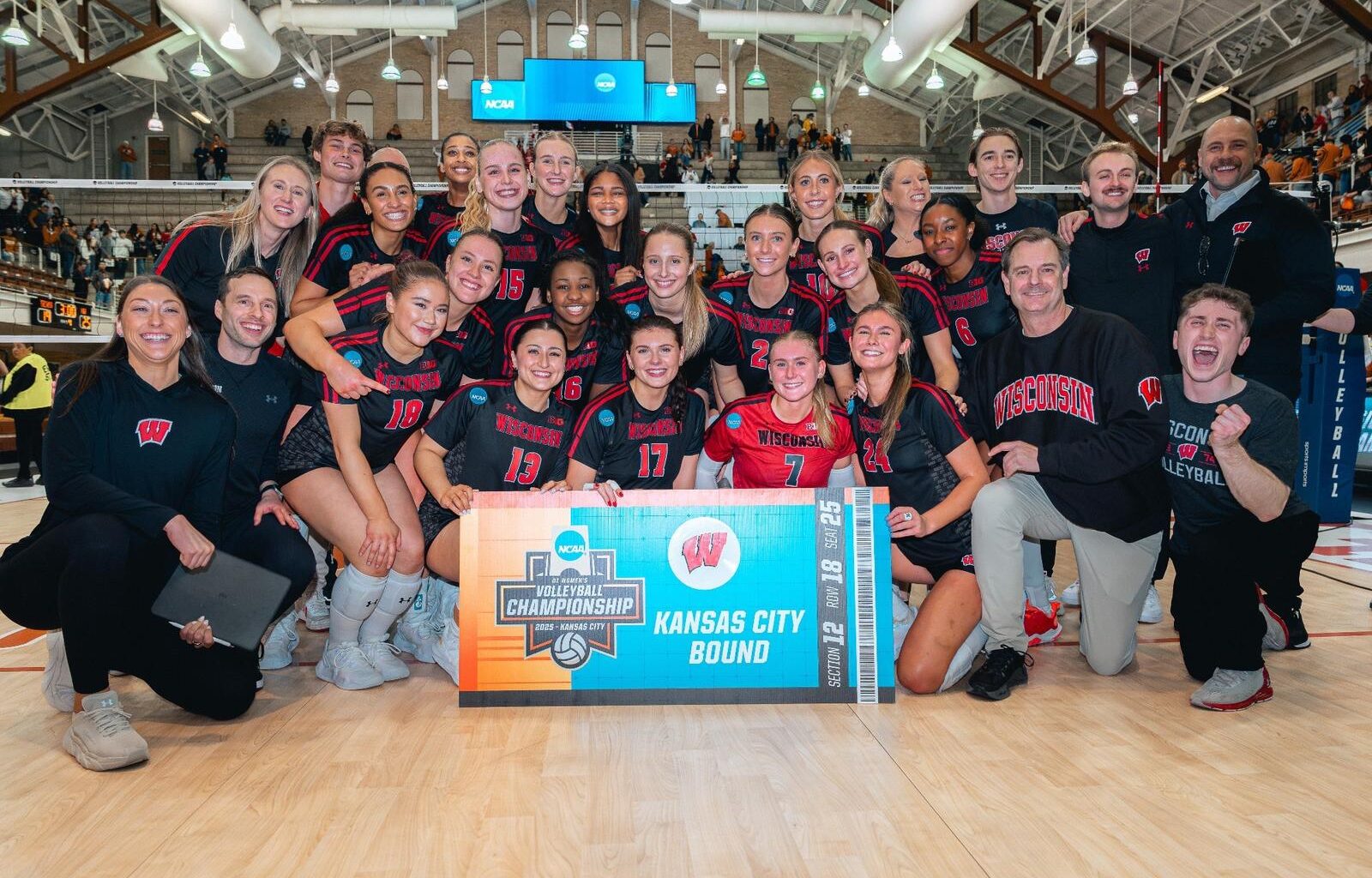 Badgers celebrate after rally versus Stanford.