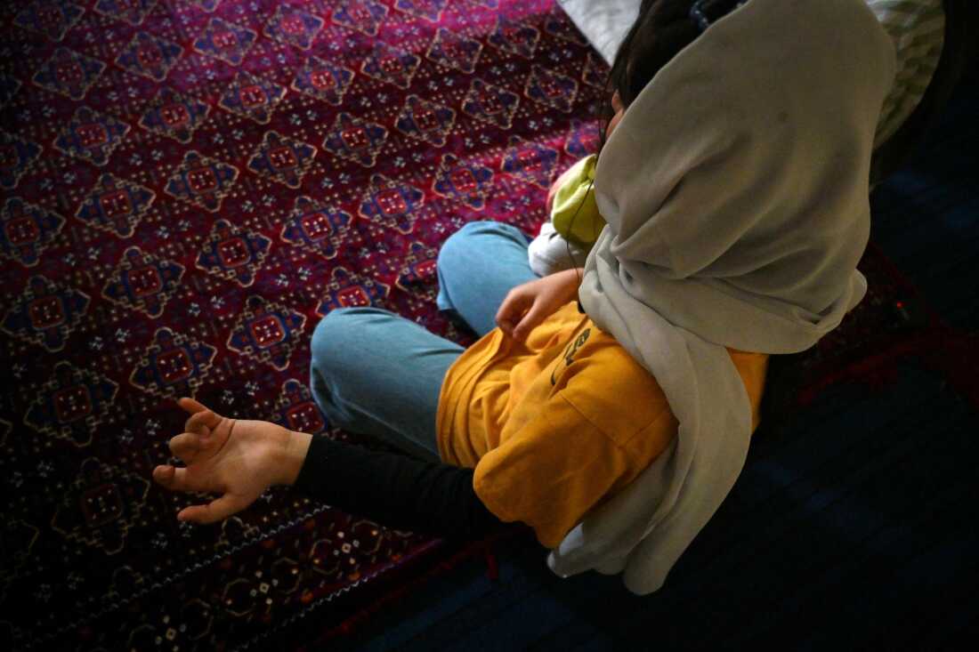 Afghan refugee girl Laylama is pictured during a September 2025 interview with AFP in Islamabad, where she was living after President Trump suspended refugee admissions to the U.S.