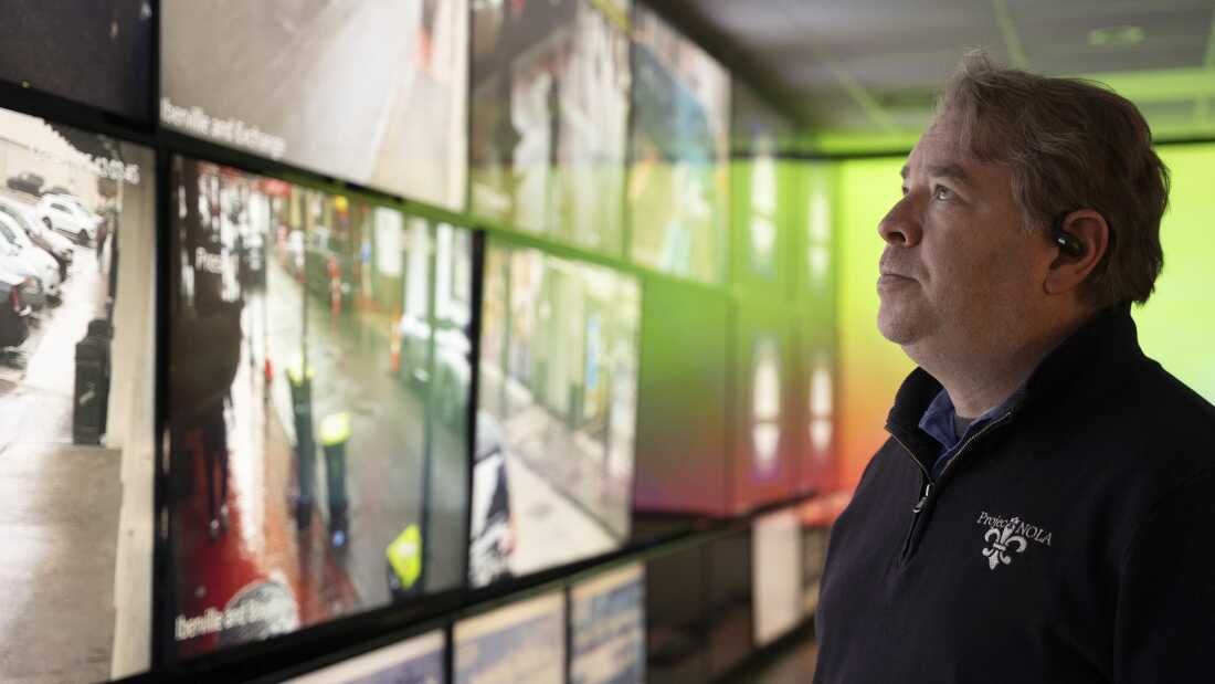 Bryan Lagarde, founder of Project NOLA, stands in front of a wall of screens displaying feeds from the nonprofit’s extensive crime camera network at its headquarters in New Orleans on Dec. 4. The system monitors thousands of cameras citywide to assist law enforcement and enhance public safety.