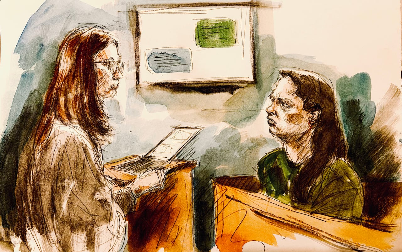 A white woman lawyer questions a witness in a courtroom sketch. The witness is a white woman in a green jumpsuit. In the background, text messages are displayed on a screen. 