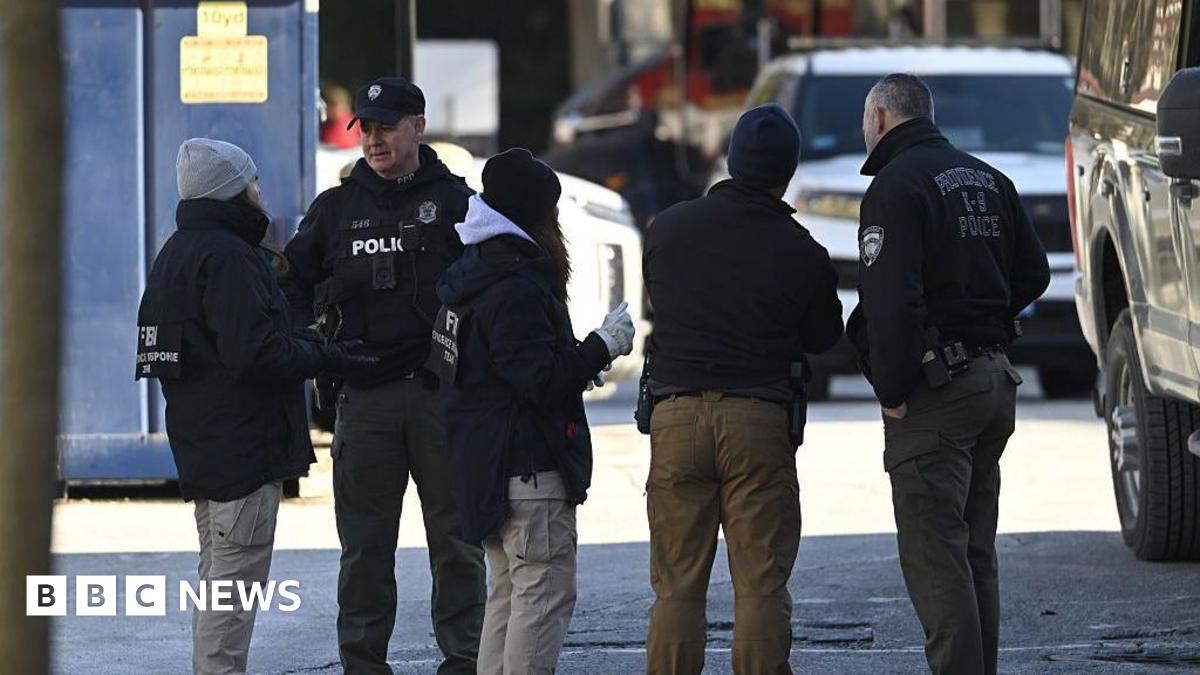 Members of the FBI Evidence Response Team work at the scene of a mass shooting at Brown University in Providence, Rhode Island on 16 December 2025
