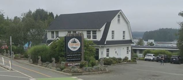 A white barn-like building.