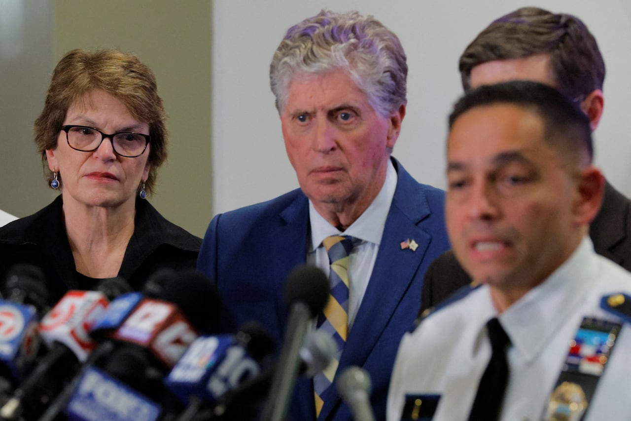 A group of officials at a news conference in Providence, R.I.